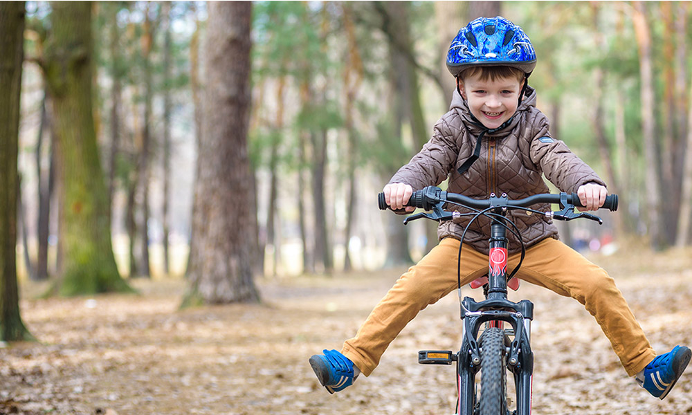 child on bike