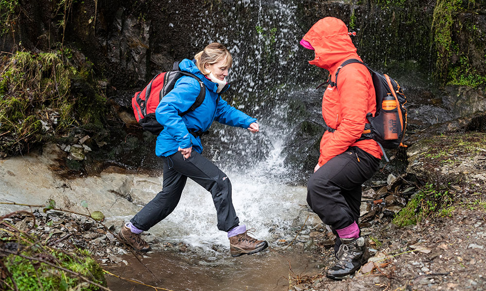 hikers crossing stream walking socks 