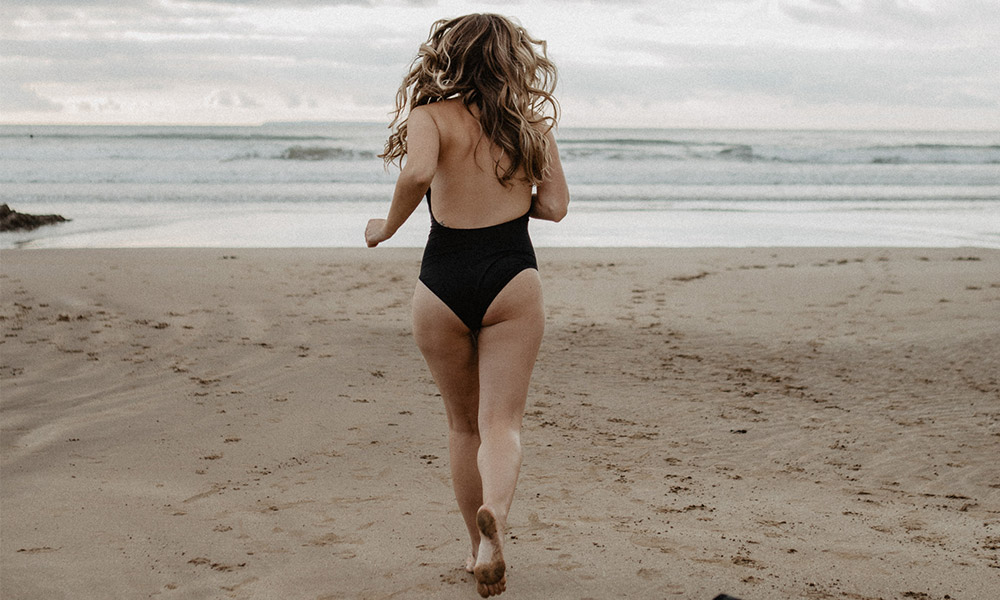 woman running into a cold sea&nbsp;