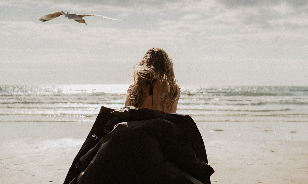 lady walking into cold water&nbsp;