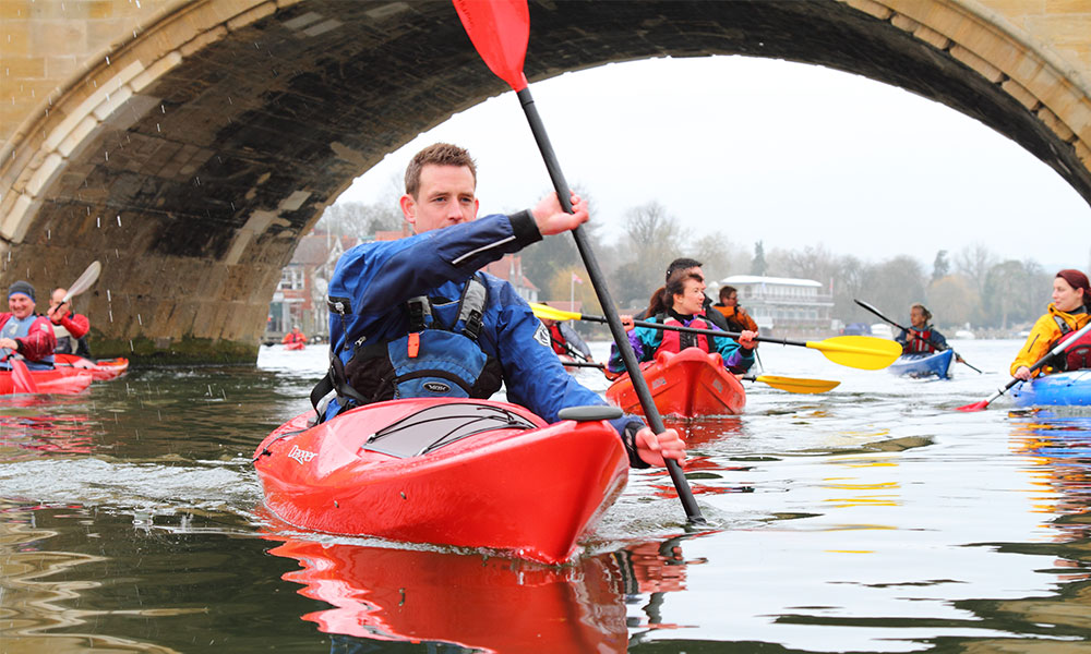 Canoeing on a river&nbsp;