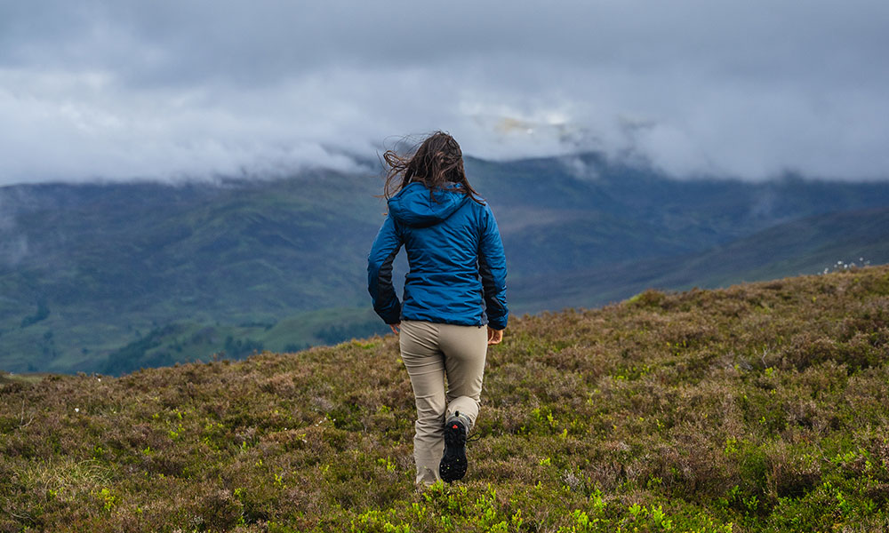 Woman hiking mountain&nbsp;