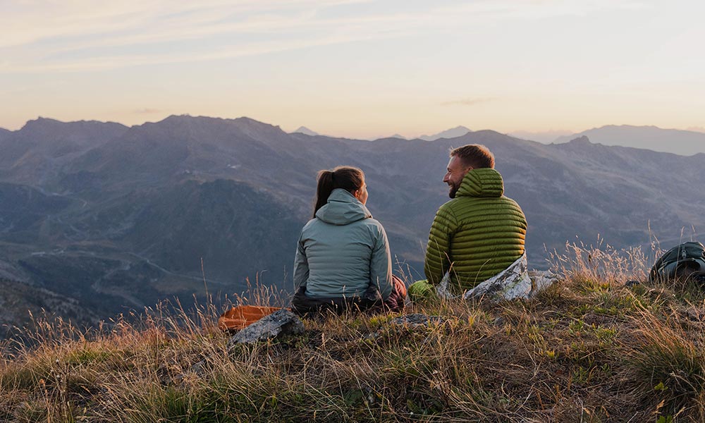 Couple wearing ethical down jackets