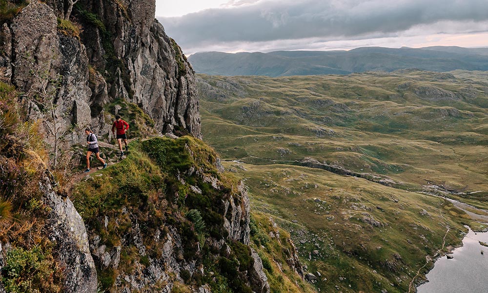 Couple running in Scotland