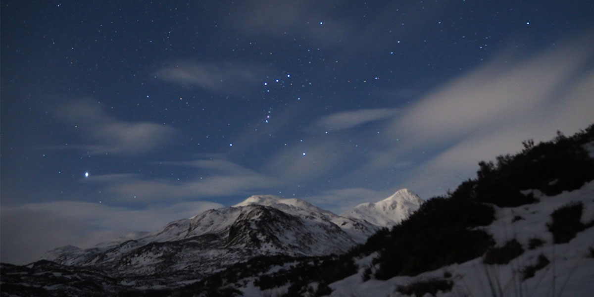 Orion over a moonlit Stob Ban from Lairig Leacach bothy
