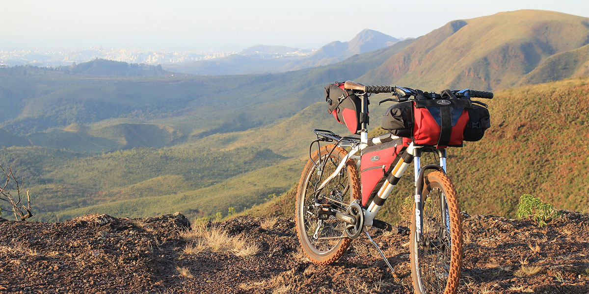 Bike on hillside in country landscape