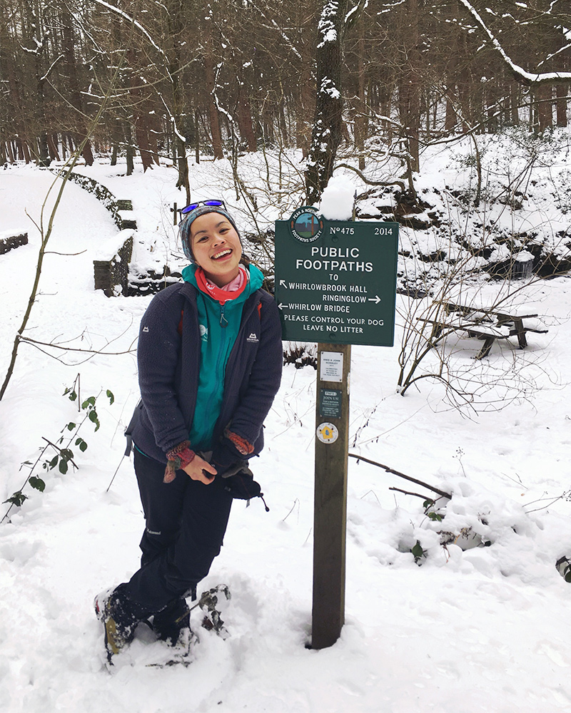 Jessie by a directions signpost