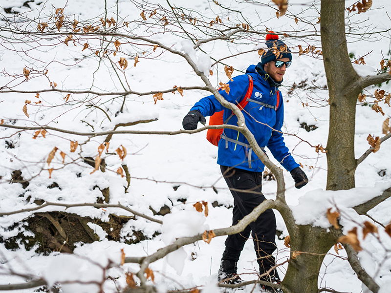 Rory walking in winter woodland
