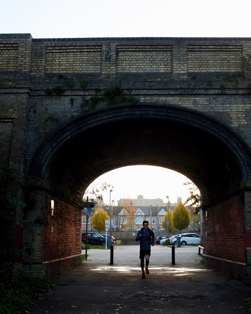 Max running under bridge
