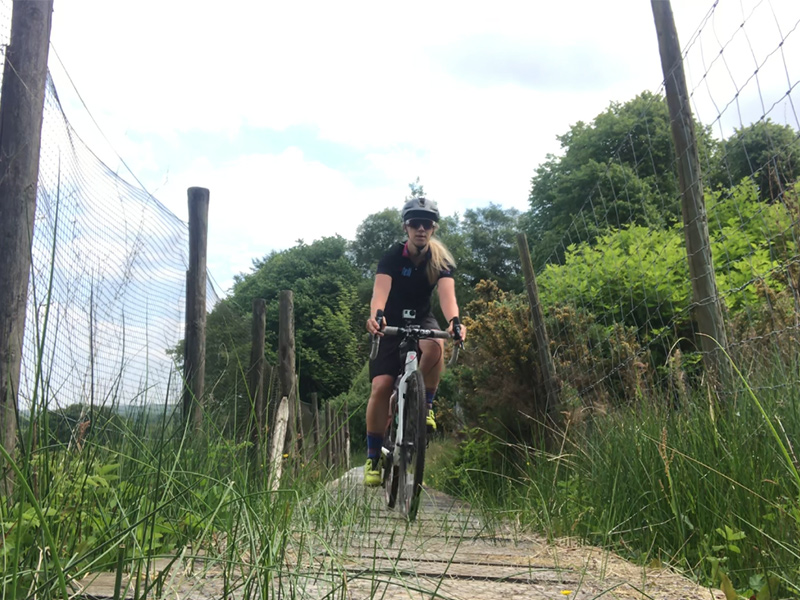 Cycling down fenced path