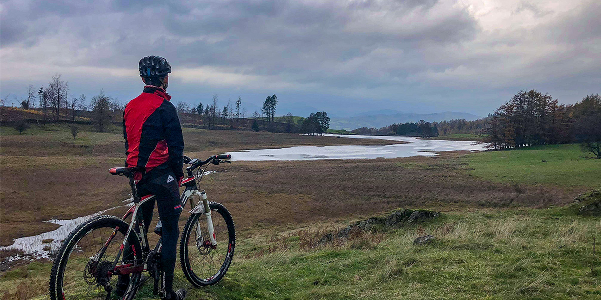 On bike, with Tarn behind