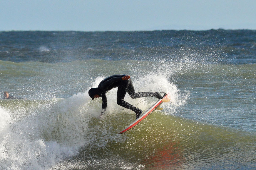 Surfing off the Pembrokeshire Coast by NickBeere. Taken from the cover of OS Explorer map OL36.