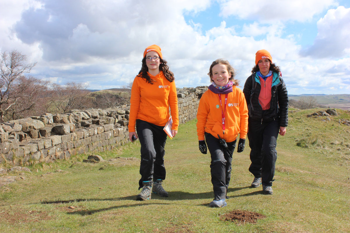 Meek family walking beside Hadrian's wall